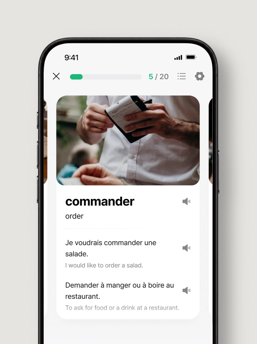 Una tarjeta de vocabulario en la app: “commander”, con frases de ejemplo.