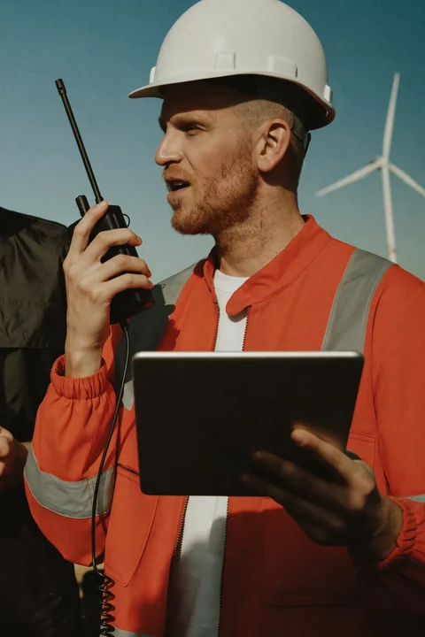 Wind-farm technician reporting by radio