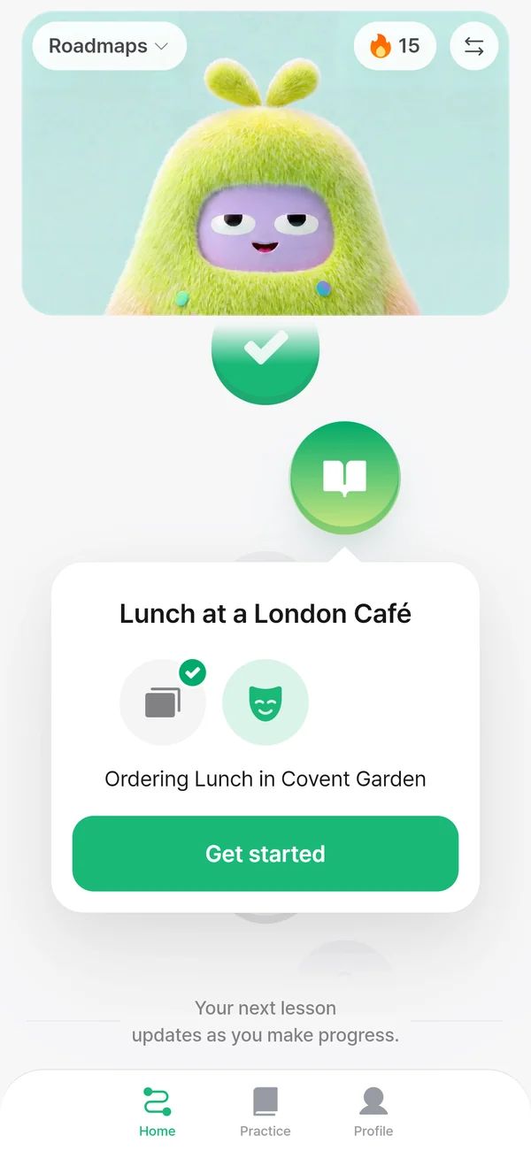 La ruta de aprendizaje en la pantalla de inicio de la app, con la siguiente lección, “Lunch at a London Café”, lista para empezar.